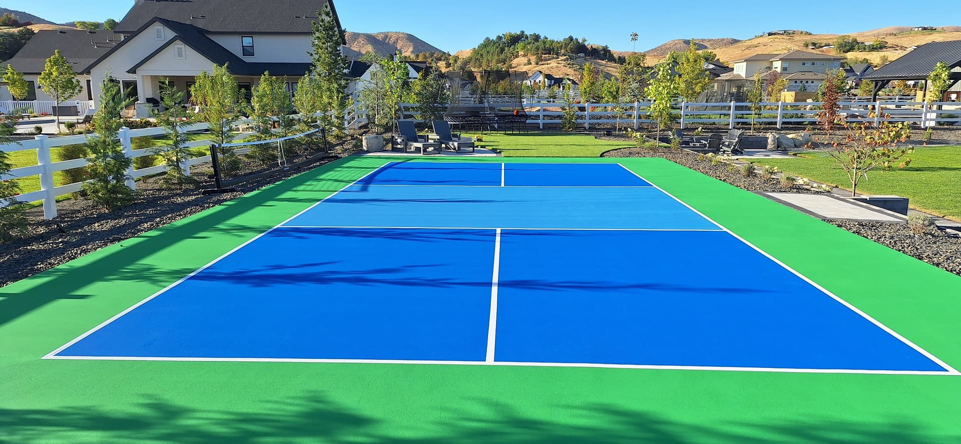 pickleball court green blue backyard