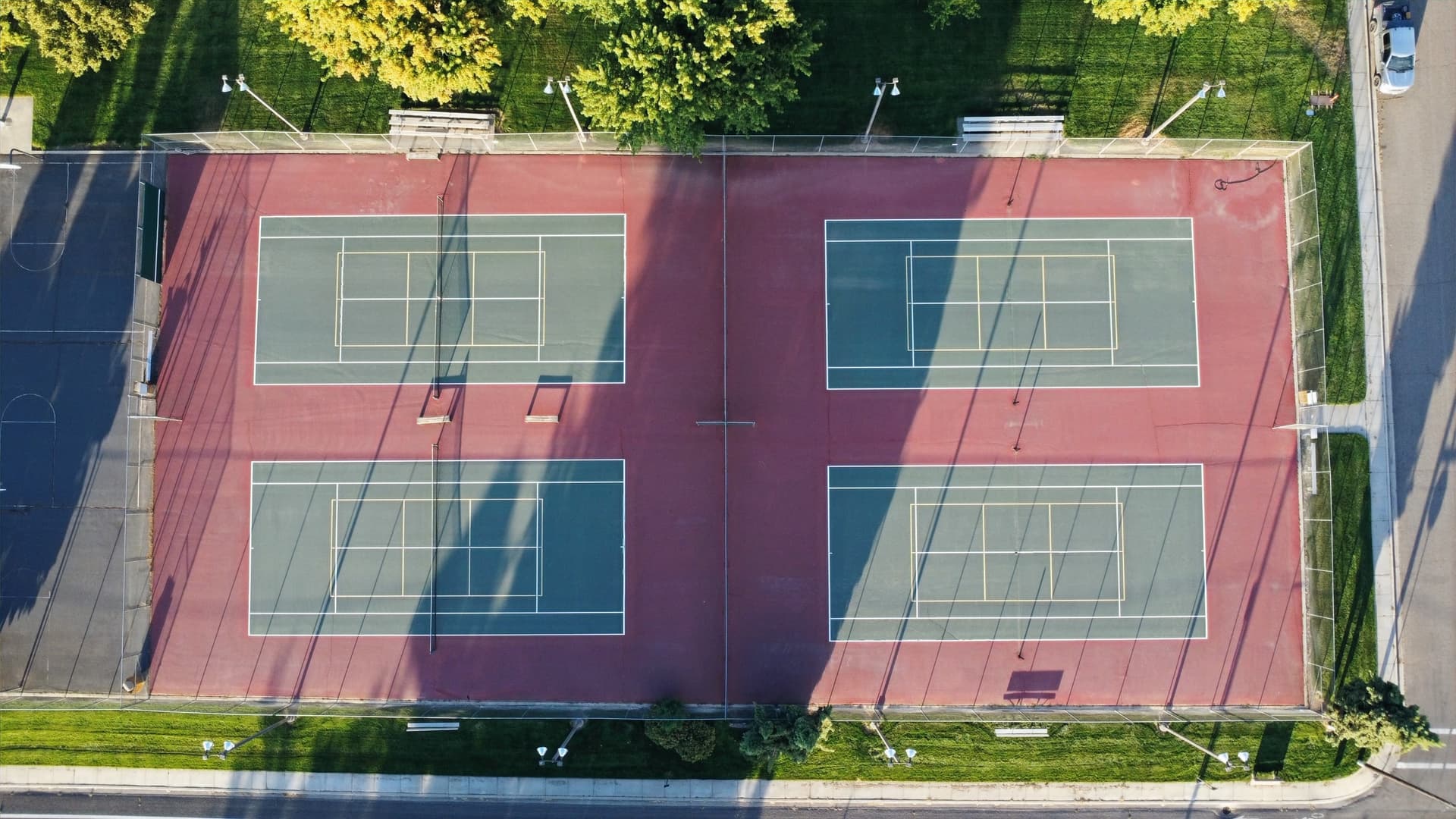 tennis court before cracks damage assessment