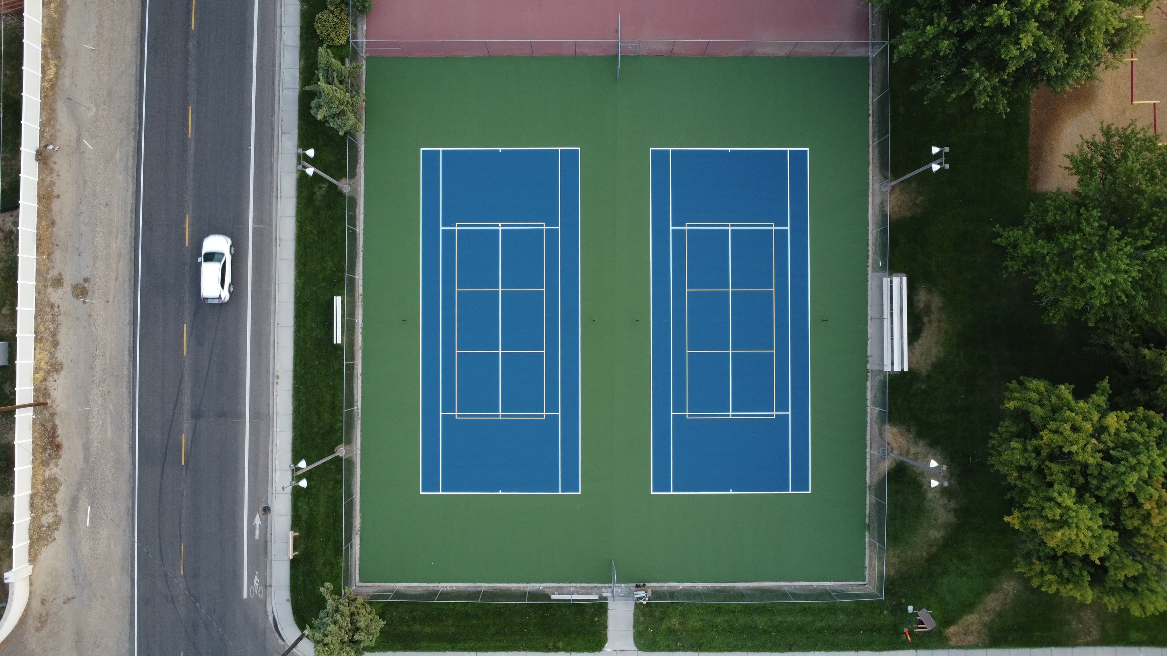 tennis court resurface blue and green acrylic outdoor installation